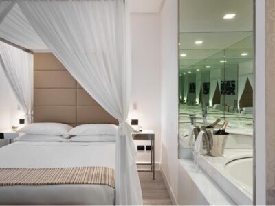Suite lit king-size avec baignoire spa